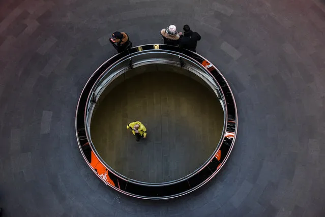 Commuters are seen in the Fulton Center subway station the day after the Christmas holiday in New York City, U.S., December 26, 2017. (Photo by Stephanie Keith/Reuters)