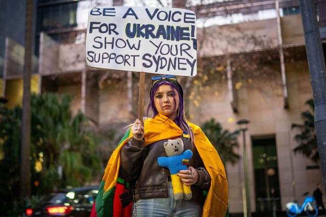 A demonstrator holds up a banner during a protest rally against the war in Ukraine, in Sydney, New South Wales, Australia, 09 July 2024. Ukraine's ambassador in Australia has called for action against Russia and aid for his nation after a children's hospital in the Ukrainian capital Kyiv was hit by a deadly missile strike on 08 July. Russian troops entered Ukrainian territory on 24 February 2022, starting a conflict that has provoked destruction and a humanitarian crisis. (Photo by Thomas Parrish/EPA/EFE)