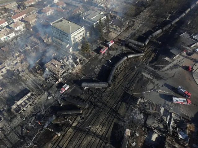 An aerial view shows the site where a cargo train derailed and exploded in the village of Hitrino, Bulgaria, December 10, 2016. (Photo by Petar Petrov/Reuters/Sky Pictures)