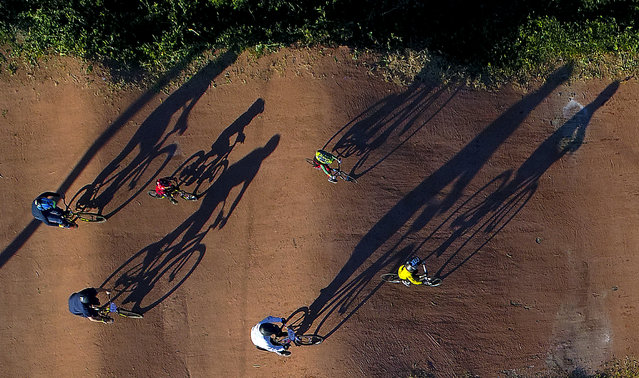 BMX riders practice at the Trumbull T.R.A.C.K BMX race course, Thursday, July 19, 2018, in Trumbull, Conn. (Photo by Julie Jacobson/AP Photo)