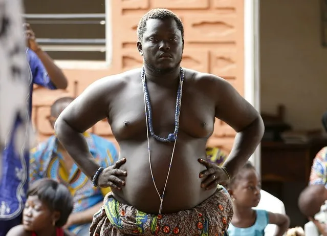 A voodoo priest attends the annual voodoo festival in Ouidah, Benin, January 10, 2016. (Photo by Akintunde Akinleye/Reuters)