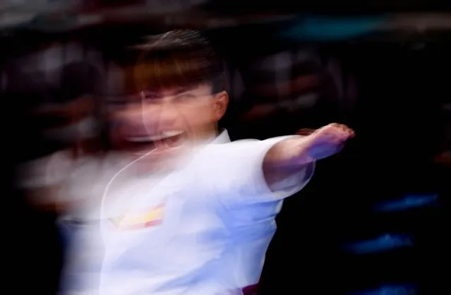 Spain's Sandra Sanchez Jaime performs in the elimination round of the Tokyo Olympic women's karate kata event on Aug. 5, 2021, at Nippon Budokan in Tokyo. (Photo by Annegret Hilse/Reuters)