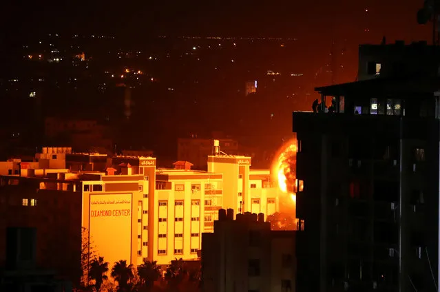 Flame and smoke are seen during an Israeli air strike in Gaza City on March 25, 2019. Israel's military launched strikes on Hamas targets in the Gaza Strip today, the army and witnesses said, hours after a rocket from the Palestinian enclave hit a house and wounded seven Israelis. (Photo by Mohammed Salem/Reuters)