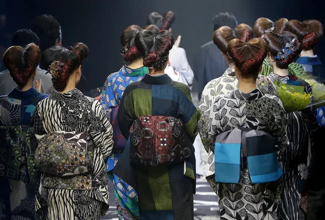 Models display creations by Japanese designer Jotaro Saito during the 2016 Autumn/Winter Collection at the Tokyo Fashion Week in Tokyo, Wednesday, March 16, 2016. (Photo by Shizuo Kambayashi/AP Photo)