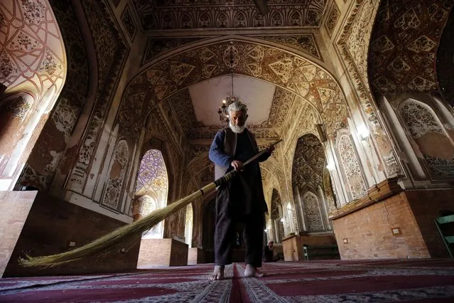 A man cleans a mosque ahead of the holy fasting month of Ramadan in Peshawar, Pakistan, 11 March 2024. The Muslims' holy month of Ramadan, which is expected to start this year on 12 March in Pakistan, is the ninth month in the Islamic calendar, and it is believed that the revelation of the first verse in the Koran was during its last 10 nights. It is celebrated yearly by praying during the night and abstaining from eating, drinking, and sexual acts during the period between sunrise and sunset. It is also a time for socializing, mainly in the evening after breaking the fast, and a shift of all activities to late in the day in most countries. (Photo by Bilawal Arbab/EPA/EFE)