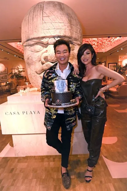 “Bling Empire” star, TV personality Kane Lim celebrates his birthday with co-star actress Kim Lee and a blinged-out birthday cake at the all-new Casa Playa inside Encore at Wynn Las Vegas in December 2021. (Photo by Toby Acuna)