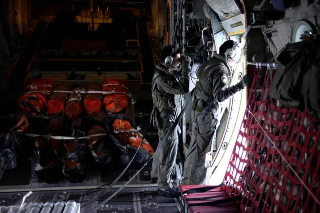 This photograph made available by The Straits Times on March 10, 2014 shows personnel from the Republic of Singapore Air Force (RSAF) scanning the seas about 140 nautical miles north-east of Kota Baru, Malaysia, for any signs of the Malaysia Airlines plane which went missing. Malaysia said there is still no trace of wreckage from the jet that vanished with 239 people on board, deepening the anguish of relatives two days after the “mystifying” disappearance. (Photo by Desmond Lim/AFP Photo/The Straits Times)
