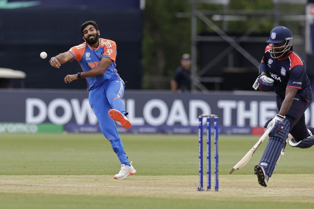 India's Jasprit Bumrah throws the ball towards the stumps in an attempt to run-out United States' Steven Taylor, right, during the ICC Men's T20 World Cup cricket match between United States and India at the Nassau County International Cricket Stadium in Westbury, New York, Wednesday, June 12, 2024. (Photo by Adam Hunger/AP Photo)