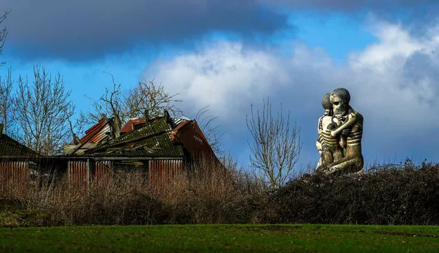 “The Nuba Survival” is a five-metre-tall statue of two skeletons locked in an embrace in Checkendon, Oxfordshire on Friday, February 4, 2022. (Photo by Steve Parsons/PA Images via Getty Images)