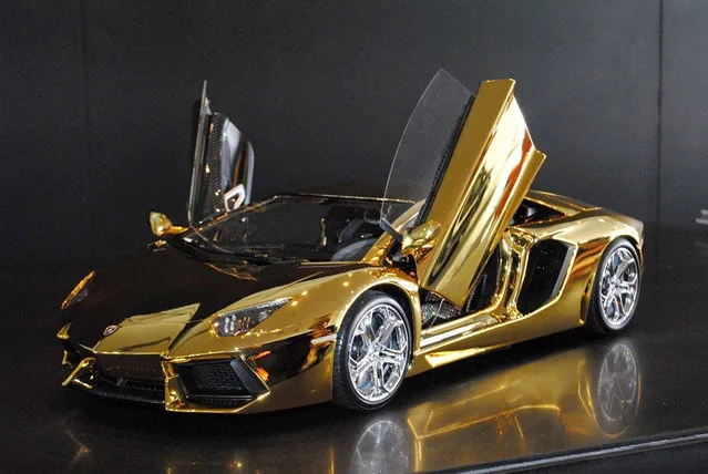 Engineer Robert Gülpen's replica model of a Lamborghini Aventador LP 700-4 in Dubai, UAE. This is the world's most expensive model car, made from carbon fibre and covered in a thin layer of pure gold. (Photo by Robert Gulpen/Barcroft Media)