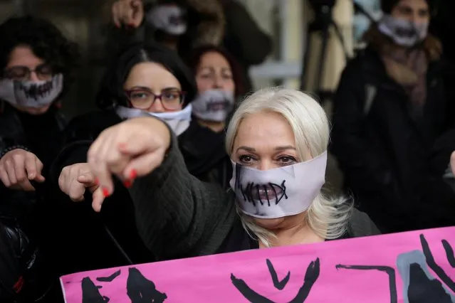 Activists take part in a demonstration, after a British woman was found guilty of faking a rape claim, outside the Famagusta courthouse in Paralimni, Cyprus on December 30, 2019. (Photo by Yiannis Kourtoglou/Reuters)