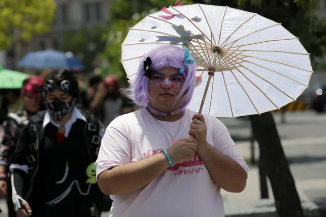 A man poses for a photo during Harajuku Fashion Walk Day in Monterrey, Mexico, July 23, 2017. (Photo by Daniel Becerril/Reuters)