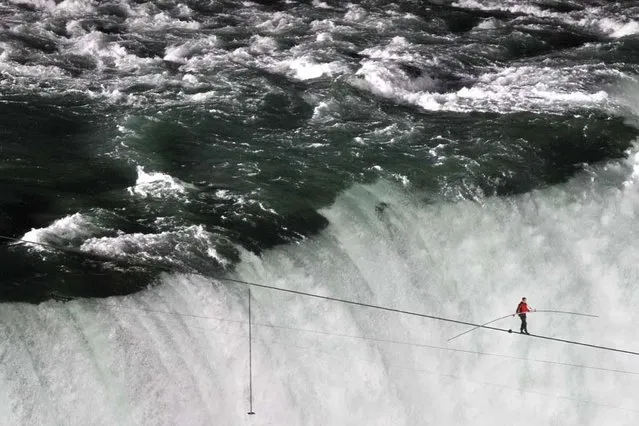 Aerialist Nik Wallenda Attempts To Cross Niagara Falls On A Tightrope