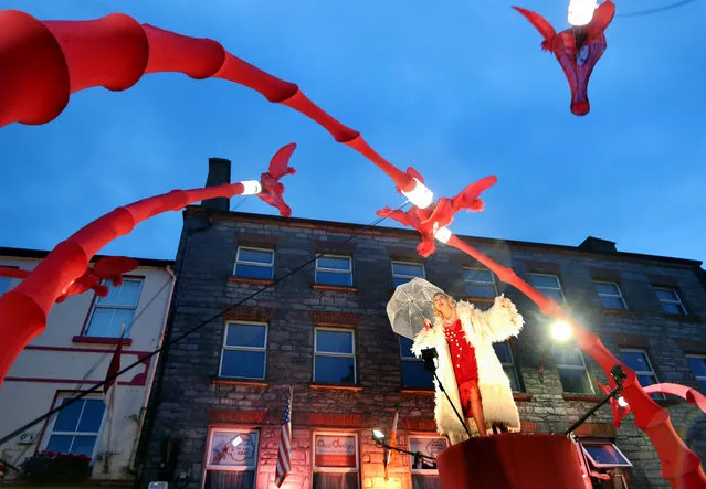 Compagnie Off street theatre company's performance of Les Girafes in the city centre during Galway International Arts Festival, Republic of Ireland at the weekend on July 16, 2022. (Photo by Joe O'Shaughnessy/The Irish Times)