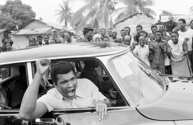 Boxer Muhammad Ali on a sightseeing tour downtown Kinshasa, Zaire  September 17, 1974. Ali is scheduled to meet opponent George Foreman on September 24, but the fight had to be delayed until October 30, 1974 because a Foreman injury. (Photo by AP Photo)
