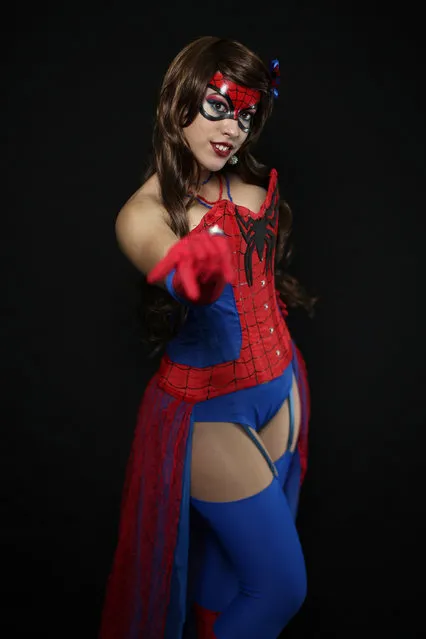 Comic Con attendee Elissa Espinell poses as pinup Spiderman during the 2014 New York Comic Con at Jacob Javitz Center on October 9, 2014 in New York City. (Photo by Neilson Barnard/Getty Images)