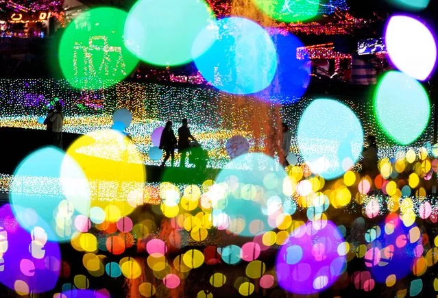 Visitors enjoy viewing a seasonal illumination show to celebrate the upcoming Christmas and the New Year holidays at the amusement park Yomiuriland in Tokyo, Japan, 04 November 2022. The illumination is produced by Motoko Ishii Lighting Design with 6.5 million bulbs, starting on 20 October 2022 through spring in 2023 as seasonal celebrations. (Photo by Kimimasa Mayama/EPA/EFE/Rex Features/Shutterstock)