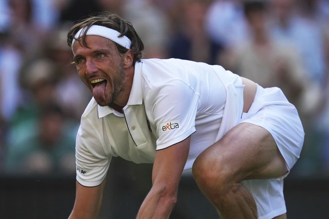 Arthur Rinderknech of France celebrates after beating Alexander Zverev of Germany in their first round men's singles match at the Wimbledon Tennis Championships in London, Tuesday, July 1, 2025. (Photo by Kin Cheung/AP Photo)
