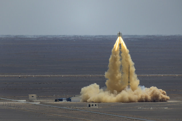 Image shows a scene during an escape flight test on China's new-generation manned spacecraft Mengzhou at zero altitude at Jiuquan Satellite Launch Center on June 17, 2025 in Jiuquan, Gansu Province of China. China successfully conducted an escape flight test on its new-generation manned spacecraft Mengzhou at zero altitude on June 17, marking an important step forward in its manned lunar exploration program. (Photo by VCG/VCG via Getty Images)
