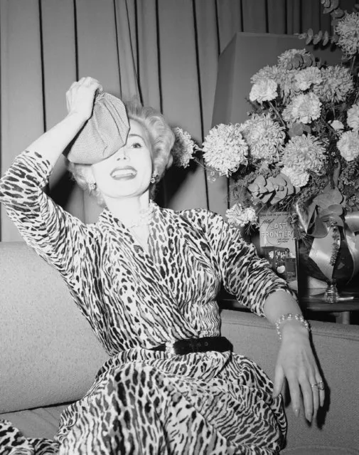 Zsa Zsa Gabor holds an ice bag over the eye where she says was hit by Porfirio Rubirosa, former Dominican Republic diplomat. She says she  refused to marry Rubirosa at Las Vegas, Nev. Rubirosa married Barbara Hutton in New York on December 30, 1953. (Photo by AP Photo)