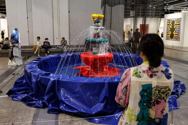 An installation titled “Fountain: Night Garden” by Nabuqi is displayed at Art Basel in Hong Kong, China on March 23, 2023. (Photo by Tyrone Siu/Reuters)