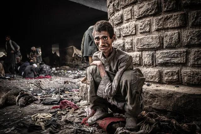 One of more than 1,000 drug addicts pictured at the Pul-e-Sukhta Bridge in Kabul on May 25, 20222. There are an estimated 6 million drug addicts in Afghanistan, a number that has risen since the Taliban retook control. (Photo by Simon Townsley/The Guardian)