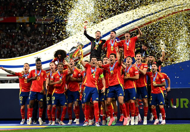 Alvaro Morata of Spain lifts the UEFA Euro 2024 Henri Delaunay Trophy after his team's victory during the UEFA EURO 2024 final match between Spain and England at Olympiastadion on July 14, 2024 in Berlin, Germany. (Photo by Michael Regan – UEFA/UEFA via Getty Images)