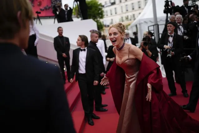 American actress and former model Uma Thurman poses for photographers upon arrival at the opening ceremony and the premiere of the film “Jeanne du Barry” at the 76th international film festival, Cannes, southern France, Tuesday, May 16, 2023. (Photo by Daniel Cole/AP Photo)
