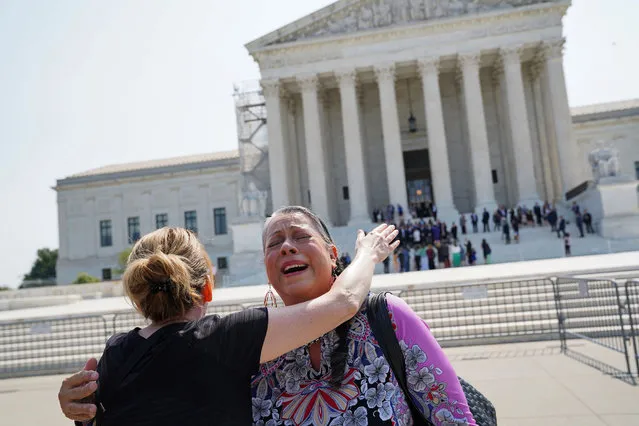 Nita Battise embraces Jennifer Margrett after the Supreme Court upheld the Indian Child Welfare outside the Supreme Court building on Thursday, June 15, 2023. Battise is a member of the Alabama-Coushatta Tribe of Texas. (Photo by Minh Connors/The Washington Post)