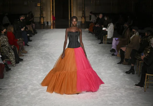 A model walks the runway during the Christian Siriano Fall/Winter 2021 show at Gotham Hall during New York Fashion Week on Thursday, February 25, 2021, in New York. (Photo by Evan Agostini/Invision/AP Photo)