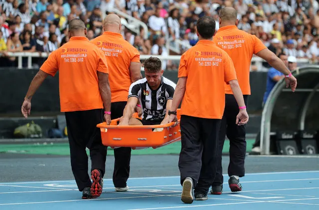 Jean of Botafogo is stretchered off after sustaining an injury during the match between Botafogo and Sao Paulo as part of Brasileirao Series A 2018 at Engenhao Stadium on September 30, 2018 in Rio de Janeiro, Brazil. (Photo by Sergio Moraes/Reuters)