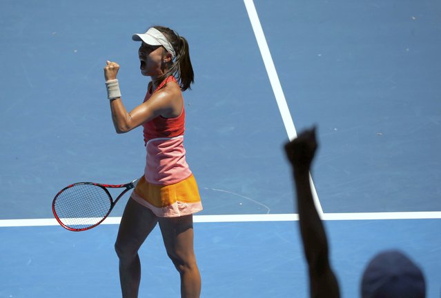 China's Wang Qiang celebrates winning her first round match against Sloane Stephens of the U.S. at the Australian Open tennis tournament at Melbourne Park, Australia, January 18, 2016. (Photo by Tyrone Siu/Reuters)