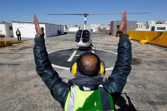 Passengers board Jordan's first “Air Taxi” a transportation service that allows Jordanians and tourists to quickly see Jordan, in Amman, Jordan, January 4, 2019. (Photo by Muhammad Hamed/Reuters)