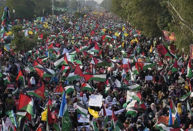 Thousands of supporters from Pakistan’s main religious political party take part in a rally against the Israeli airstrikes on Gaza to show solidarity with Palestinian people, in Lahore, Pakistan, Sunday, November 19, 2023. (Photo by K.M. Chaudary/AP Photo)