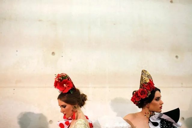 Models wearing creations by Alvaro Baturone on the backstage, during the International Flamenco Fashion Show SIMOF in the Andalusian capital of Seville, Spain February 8, 2019. (Photo by Marcelo del Pozo/Reuters)