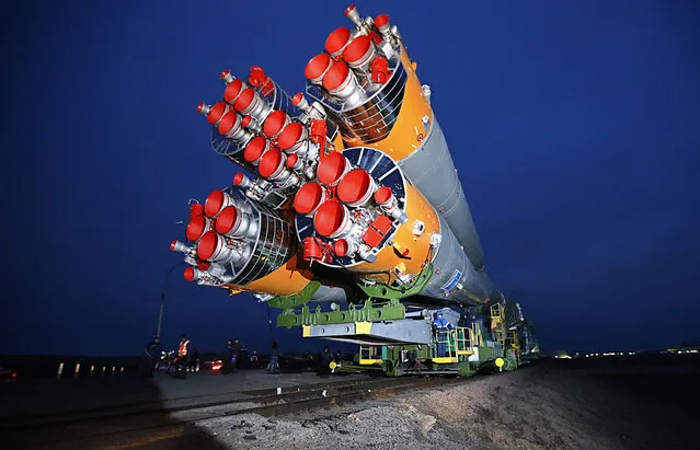 Russian Soyuz TMA-20M rocket booster is moved for installation at the launch pad at Baikonur cosmodrome in Kazakhstan, 16 March 2016. The crew is set to take off from Kazakhstan's Baikonur cosmodrome to the International Space Station (ISS) on 19 March 2016. (Photo by Yuri Kochetkov/EPA)
