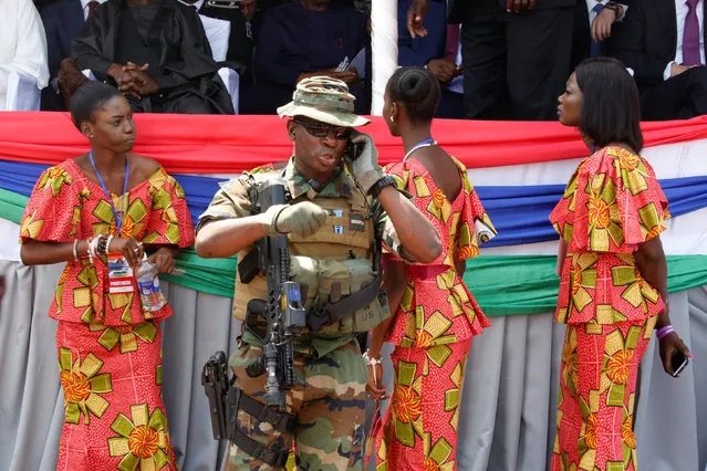 A member of the regional ECOWAS force stands guard during President Adama Barrow swearing-in ceremony and the Gambia's Independence day ceremony at Independence Stadium, in Bakau, Gambia February 18, 2017. (Photo by Thierry Gouegnon/Reuters)