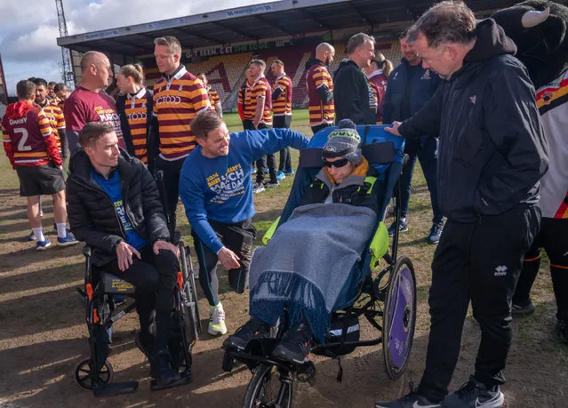 (Left to right) former football player Stephen Darby, Mark Newton with his brother-in-law and former rugby player Rob Burrow and former football player Marcus Stewart at Bradford City Football Club's Valley Parade stadium in Bradford, UK on Friday, March 22, 2024, ahead of taking part in the 'March of the Day' trek, one of the biggest fundraising events for the Darby Rimmer MND Foundation to raise awareness for motor neurone disease. (Photo by Danny Lawson/PA Images via Getty Images)