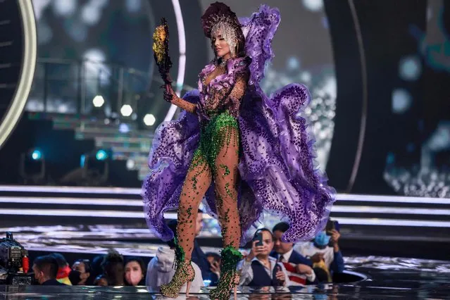 Miss Venezuela, Luiseth Materan, appears on stage during the national costume presentation of the 70th Miss Universe beauty pageant in Israel's southern Red Sea coastal city of Eilat on December 10, 2021. (Photo by Menahem Kahana/AFP Photo)