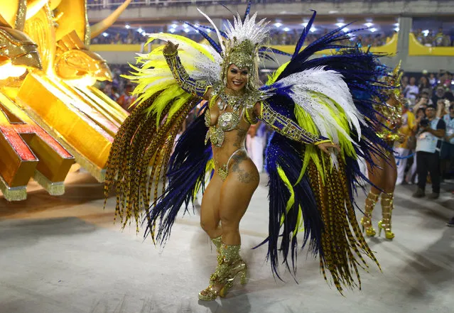 A reveller from Uniao da Ilha samba school performs during the second night of the carnival parade at the Sambadrome in Rio de Janeiro, Brazil February 27, 2017. (Photo by Pilar Olivares/Reuters)