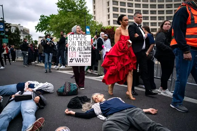 Demonstrators try to block arriving guests outside of the Washington Hilton, the site of the Annual White House Correspondents Dinner, on April 27, 2024 in Washington, DC. President Joe Biden is attending the event where demonstrators are attempting to blockade the entrance in protest of the Biden administration's continued support of Israel despite the calls for a cease fire between Israel and Hamas. (Photo by Kent Nishimura/Getty Images)