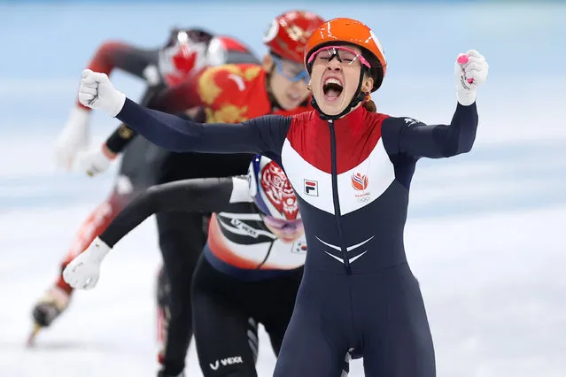 Suzanne Schulting of Team Netherlands celebrates winning the Gold medal in a new Olympic Record time of 4:03.40 during the Women's 3000m Relay Final A on day nine of the Beijing 2022 Winter Olympic Games at Capital Indoor Stadium on February 13, 2022 in Beijing, China. (Photo by Matthew Stockman/Getty Images)