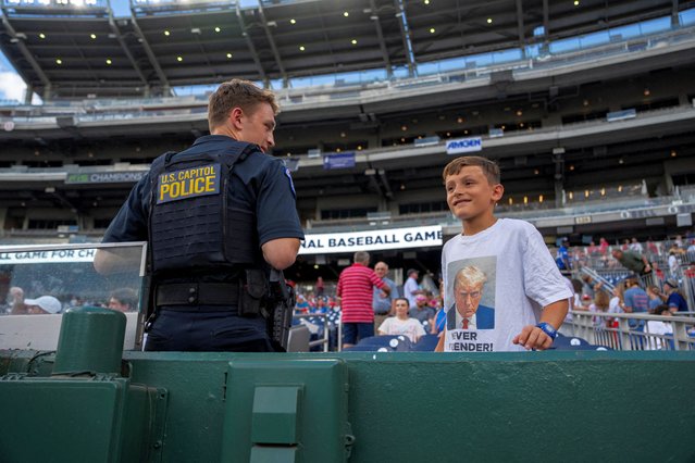 Tomas Jimenez, 10, wears a shirt with the mugshot of Trump prior to the start of the annual Congressional Baseball Game for Charity at Nationals Park in Washington on June 12, 2024. (Photo by Ken Cedeno/Reuters)