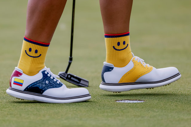 The socks of Mariajo Uribe of Colombia on the 18th green during the first round of the Paris 2024 Olympic Games Women's Individual Stroke Play golf competition at Le Golf National in Guyancourt, France, 07 August 2024. (Photo by Erik S. Lesser/EPA/EFE)