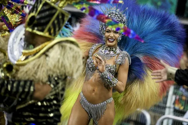 Drum queen Veronica Bolani from Vai-Vai samba school performs during the second night of the Carnival parade at the Anhembi Sambadrome in Sao Paulo, Brazil on April 23, 2022. (Photo by Carla Carniel/Reuters)