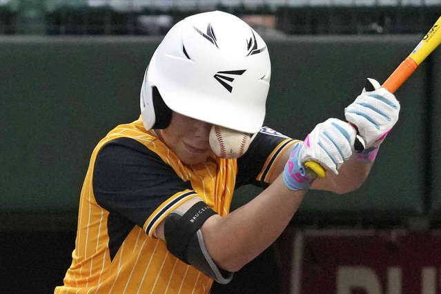 Lake Mary, Fla.'s Lathan Norton is hit by a pitch that bounces off his arm into his face during the third inning of a baseball game against Puyallup, Wash., at the Little League World Series in South Williamsport, Pa., Friday, August 16, 2024. (Photo by Gene J. Puskar/AP Photo)