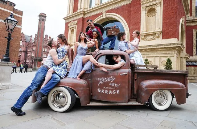 Richard Winsor, Ashley Shaw, Zizi Strallen, Glenn Graham, Nicole Kabera, Harrison Dowzell, Will Bozier and Cordelia Braithwaite during a photo call for Sir Matthew Bourne's The Car Man at the Royal Albert Hall, London on May 11, 2022, a reinterpretation of Bizet's Carmen, staged in 1960s American diner-garages with a specially expanded 65-dancer production for the hall, as part of its 150th anniversary. (Photo by Ian West/PA Images via Getty Images)