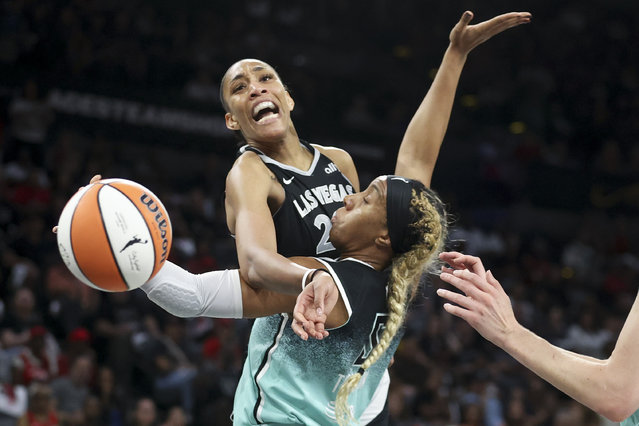 Las Vegas Aces center A'ja Wilson reacts while being fouled by New York Liberty forward Kayla Thornton during the first half of a WNBA Semifinal basketball game, Sunday, October 6, 2024, in Las Vegas. (Photo by Ian Maule/AP Photo)