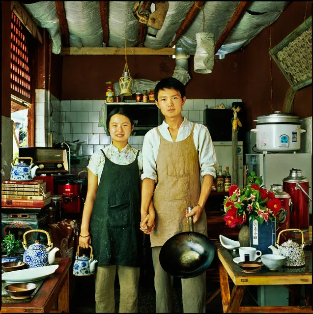 Japanese-born, Paris-based Kiyoshi has been taking these florid portraits of people surrounded by their possessions since 2003. Here: Mei-Mei and Shao Yu Dali, China, 2012. (Photo by Mami Kiyoshi/Galerie Annie Gabrielli/The Guardian)