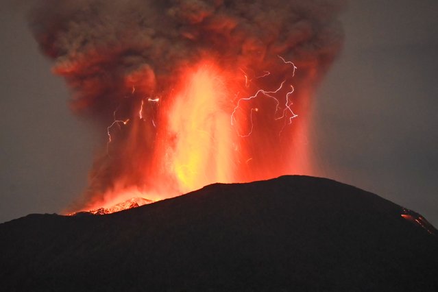 This handout photo taken and released by the Center for Volcanology and Geological Hazard Mitigation (PVMBG) on October 16, 2024 shows Mount Ibu erupting in Indonesia's North Maluku Province. (Photo by Center for Volcanology and Geological Hazard Mitigation /Handout via AFP Photo)